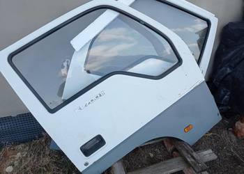 Drzwi z szybą prawe i lewe Kia K2700 białe