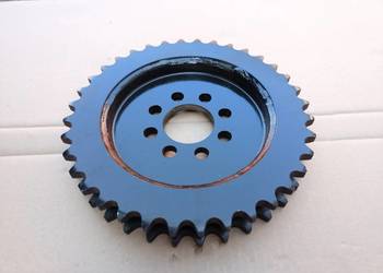 87374591 Koło zębate łańcuchowe podwójne podbieracza trawy New Holland FP