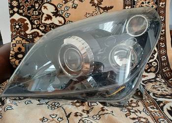 Lampa lewa opel astra h bixenon skrętna