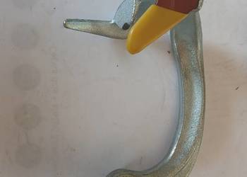 Przytrzymywacz sznurka ze sworzniem New Holland