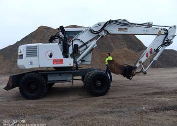 Liebherr 312 z osprzętem .