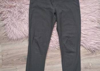 Świetne materiałowe spodnie oliwkowe khaki rurki na gumce 38