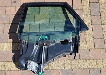 Podnośnik szyby lewy tył ramka szyba Audi 80 B4 sedan 893839399