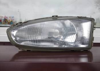 Mitsubishi Colt V CJ0 lampa przednia lewa reflektor przód kierowcy oryginał