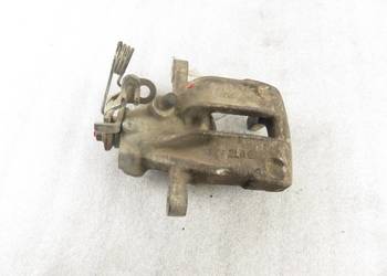 ZACISK PRAWY TYŁ AUDI A6 C4 2.5 TDI