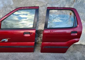Suzuki Ignis FH 00-03 drzwi przód tył przednie LEWE Z5K