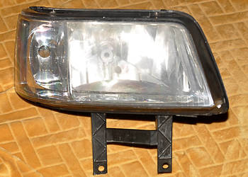 Reflektor prawy VW Transporter 5 OE 7H1941016N EUROPA