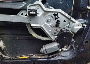 Mechanizm szyby lewy tył BMW E34 elektryczny