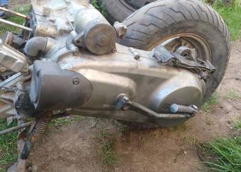 Suzuki AN125 silnik lagi wał rozrusznik karter koło stator