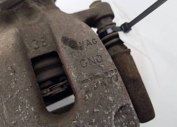 ZACISK HAMULCOWY TYŁ PRAWY SKODA OCTAVIA III 1.6TD