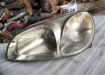 KIA CARNIVAL  LAMPA PRZÓD PRZEDNIA LEWA