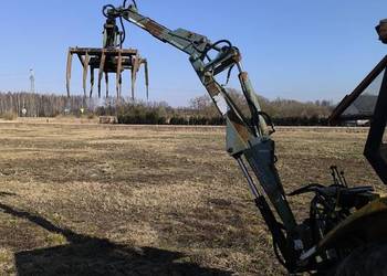 Ładowacz Trol. Zawieszany chwytak, koparka.