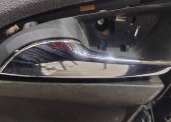 Klamka drzwi wewnętrzna Opel Astra J
