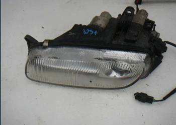 Lampa przód lewa Mazda 323 f