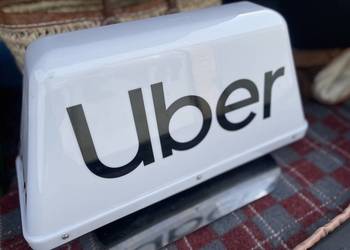 Uber Kogut taxi Logo