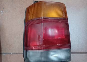 LAMPY  lewa TYŁ MAZDA 323 STATION