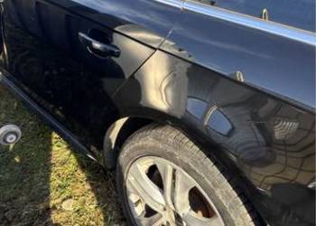 Błotnik ćwiartka lewy tył audi A4 lift kolor LY9T