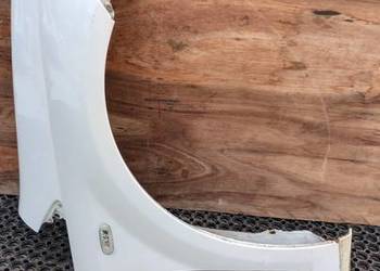 FIAT PUNTO EVO BŁOTNIK PRZÓD PRAWY 296/A