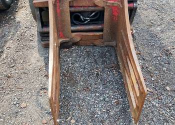 Chwytak obrotowy do wózka widłowego