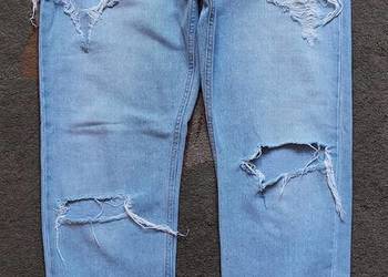 Sprzedam Jeansy H & M z rozdarciami