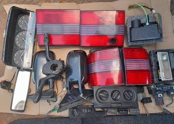 Vw passat b4 kombi lampa prawa lewa w klape  blotnik komplet