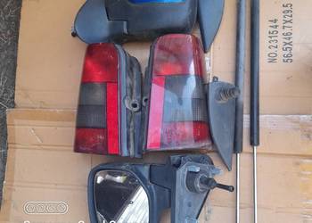 BERLINGO I,lusterko,lampa tyl,silownik klapy