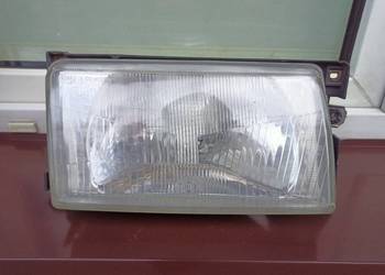 VW Polo III 86c2f lampa przednia prawa reflektor przód pasażera Hella
