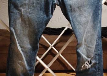 Męskie spodnie jeansowe z dziurą GUESS rozmiar 30