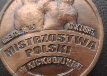 Medale pamiątkowe z półmaratonu kickboxingu