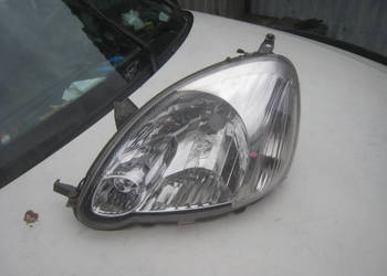 Lampa przednia lewa TYC Toyota Yaris I lift 03-06
