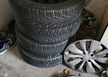 Komplet koła 15" do Suzuki. Felgi + opony zimowe + kołpaki.