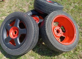Alufelgi czarno-czerwone z oponami 4 x 108 195/55 r.15