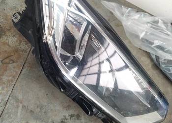 Reflektor prawy passat b8 oryginalny