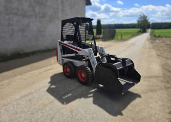 Miniładowarka BOBCAT 310, 4x4 + łyżko-krokodyl, 90 cm szerokości, waga 1 t