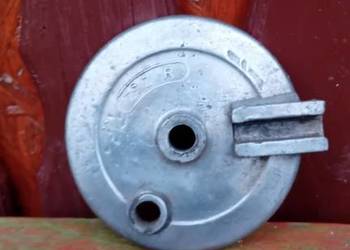 Szczękotrzymacz dekiel bęben koła tył tylnego romet motorynka komar kadet