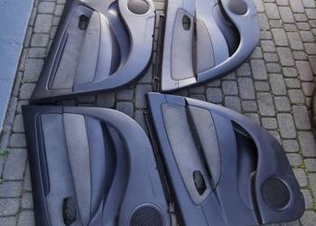 Tapicerki drzwi fotele Renault Scenic 3