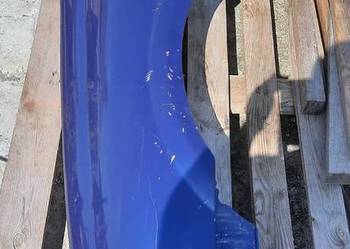 Błotnik lewy przód Nissan Almera n16  polift kolor BW6G