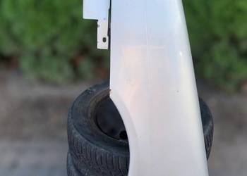 Renault Megane II 2 Błotnik LEWY PRZÓD kolor nieznany 8200011076