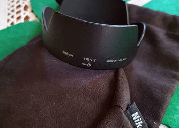 Osłona przeciwsłoneczna Nikon HB-32 i pokrowiec na obiektyw