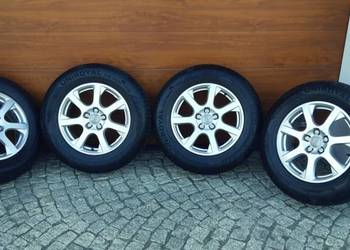 Felgi aluminiowe Audi 17 z oponami zimowymi 235/65 R17 UNIROYAL XL