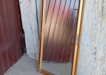 lustro w złotej ramie / 427