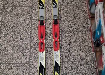 Narty biegowe FISCHER 140 cm + wiązania NNN + łuska
