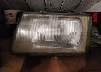 Lampy reflektory przednie Audi 100 c3 Bosch elektryczne