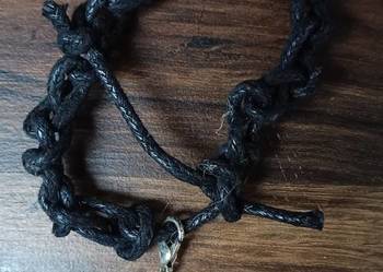 Bransoletka na rękę z metalową głową orła