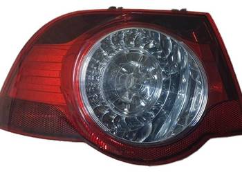 Lampa tylna lewa zewnętrzna VW EOS 1Q0945095H oryginalna używana