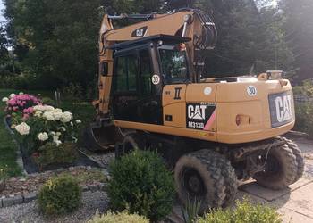 Caterpillar M313D koparka