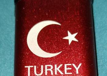 sprzedam zapalniczkę nazwa pisze na zdjęciu na gas