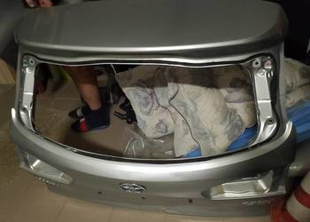 Klapa bagażnika tylna toyota corolla cross hybrid cros srebrna szara