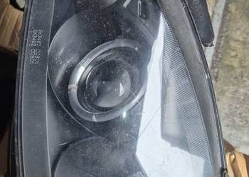 OPEL CORSA C 01-06,COMBO  REFLEKTOR LAMPA LEWA SONAR SK3302.SPRAWNA