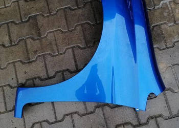 HONDA FRV FR-V 2005 BŁOTNIK LEWY PRZÓD B520P